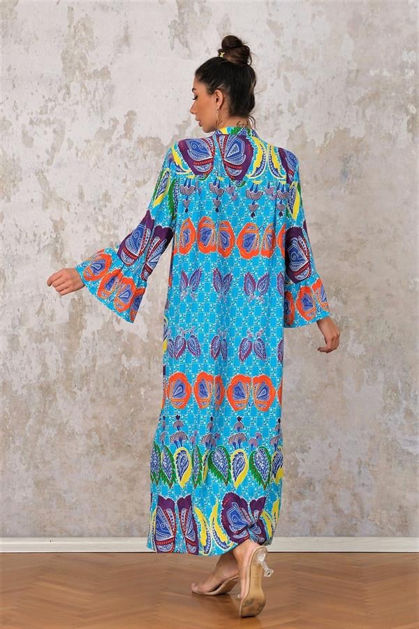 Mavi Volanlı Kol Önden Düğmeli Eteği Kat Kat Tropikal Desenli Uzun Elbise